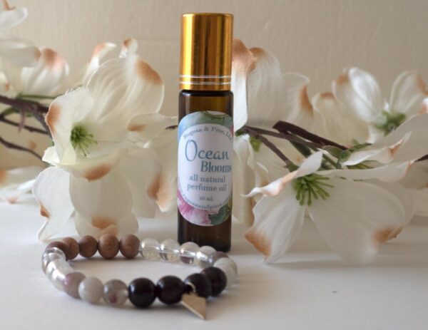 Product image of  Nevada Garnet Kunzite Gemstone Bracelet Perfume Oil Aromatherapy Set