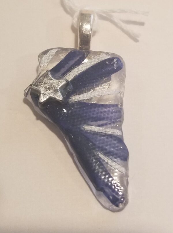 Product image of  Responsibly collected beach glass pendant – Nevada shape with star and silver & blue stripes