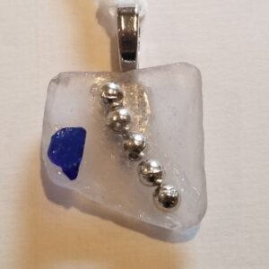 Product image of  Nevada-shaped pendant, East coast seaglass, with Carson City blue NV-shaped glass, pewter beads