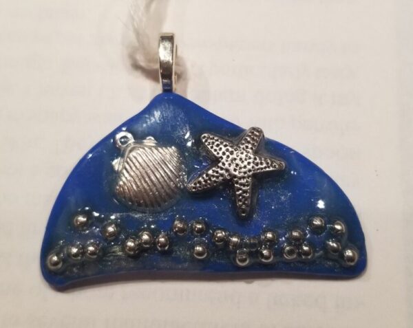 Product image of  Sea Blue Glass Pendant with Starfish & Seashell Charms