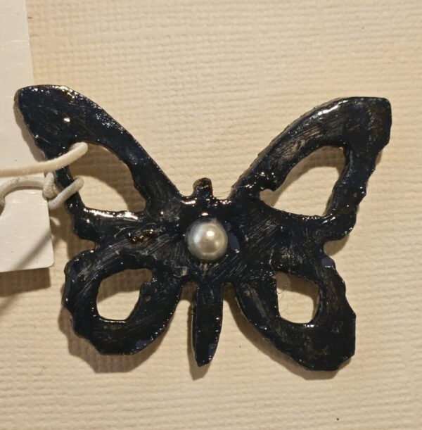 Product image of  Metal butterfly – small blue w pearl adornment