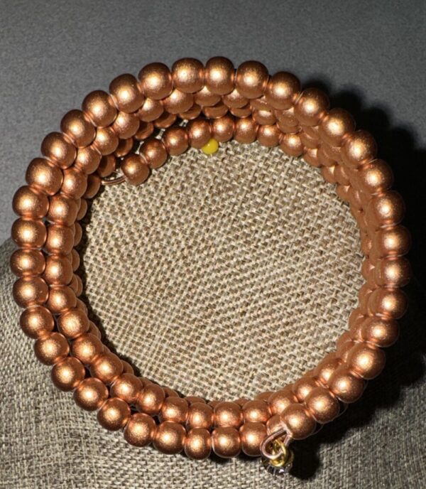 Copper colored bead winding bracelet