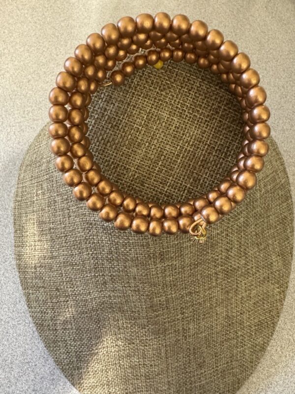 Copper colored bead winding bracelet