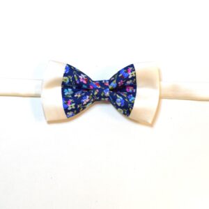 Blue bowtie multi color flowers with white border